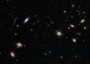 Скопление галактик Кома глазами Hubble