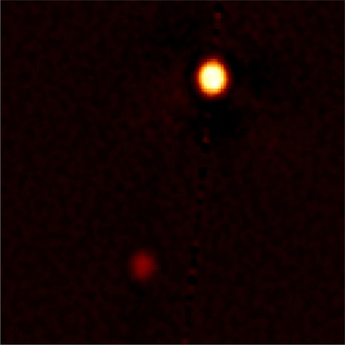 Самый лучший снимок Плутона, сделанный с Земли