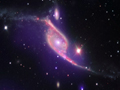 Столкновение галактик - ключ к росту черной дыры