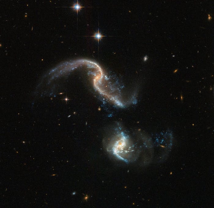 Раннее слияние галактик от Хаббла