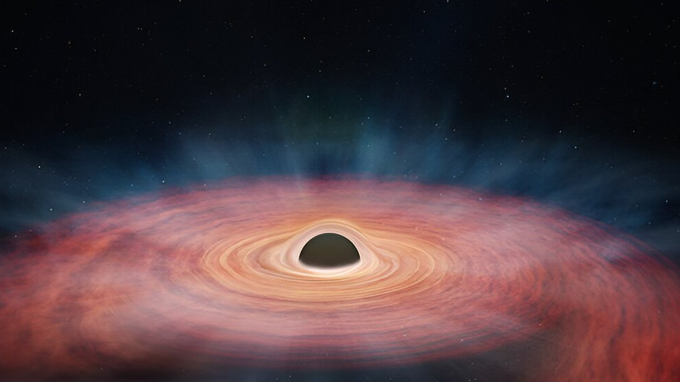 Гигантская черная дыра уничтожает массивную звезду
